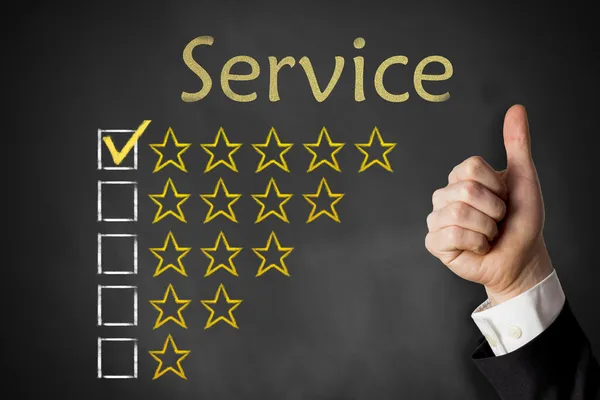 Thumbs up service rating stars chalkboard — Stock Photo, Image