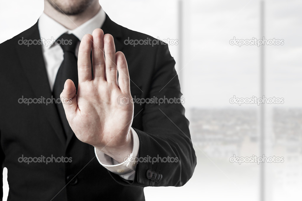 businessman hand stop