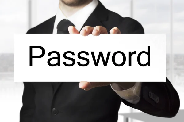 Businessman holding sign password — Stock Photo, Image