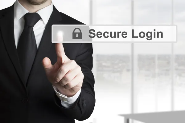 Businessman pushing touschscreen secure login — Stock Photo, Image