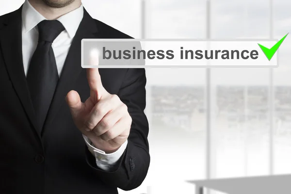 Businessman pushing button business insurance Royalty Free Stock Photos