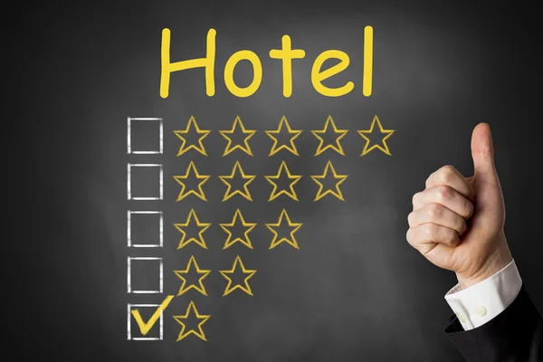 Pulgares up pizarra clasificación del hotel una estrella —  Fotos de Stock