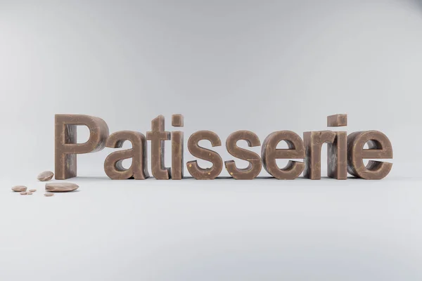 Closeup Lettering Patisserie Made Brown Whole Milk Chocolate Clean Surface — Stockfoto