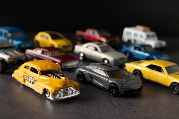 Many colorful miniature car models reminding childhood memories