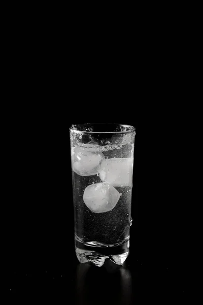 Ice Cubes Thrown Glass Water Splash Black Background — Fotografia de Stock