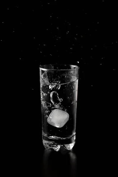 Ice Cubes Thrown Glass Water Splash Black Background — 스톡 사진