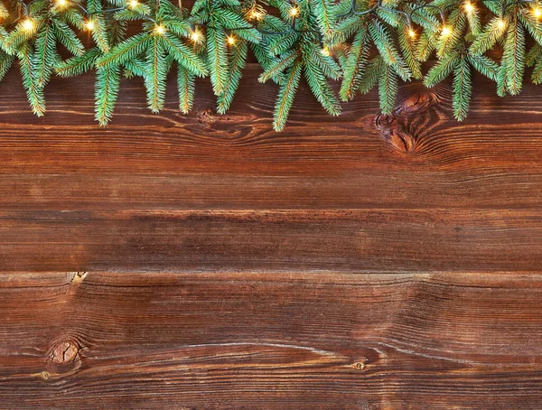 Horizontal Nahtlose Weihnachtsdekoration Aus Tannenzweigen Mit Weihnachtsbeleuchtung Auf Rustikalen Holzplanken — Stockfoto