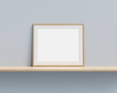 Picture frame mock up on wooden shelf against pastel painted wall. 3D render. 3D illustration.