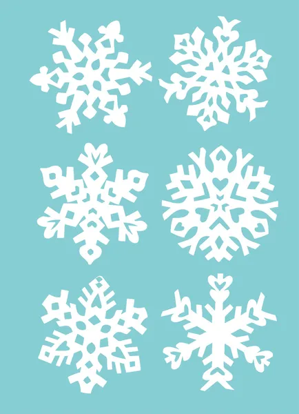 Copos de nieve papel de mano corte — Vector de stock