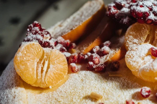 Close Decor Christmas Cake Decorated Tangerines Pomegranate Powdered Sugar Traditional — Stock Photo, Image