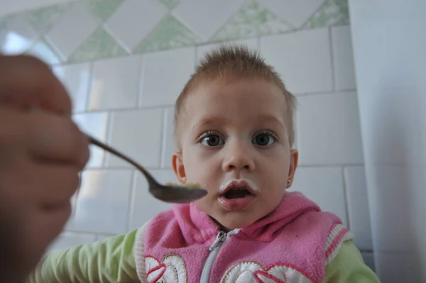 Mum Feed Baby Spoon Close Child Who Has One Year — Stock Photo, Image