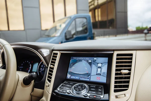 Dashboard with car and settings. Car with options and settings of self-driving system. Interface on the screen. Rear view camera monitor