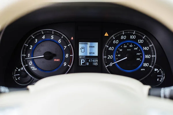 Car Dashboard. Dashboard modern car control with backlight speed display panel.