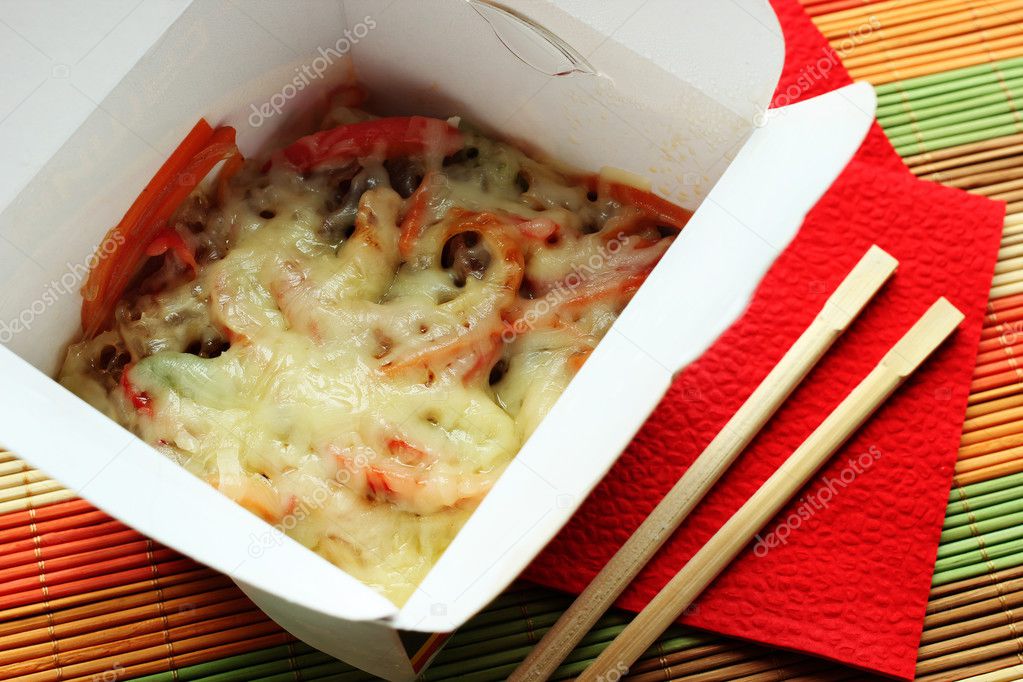 Noodles with cheese and vegetables in box