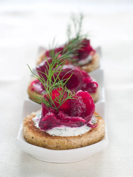 Canapes with salmon and cheese — Stock Photo, Image