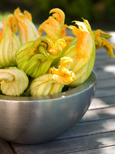 Courgettes or zucchini with flowers — Stock Photo, Image