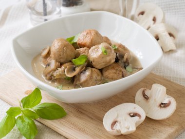 Meatballs with mushrooms clipart