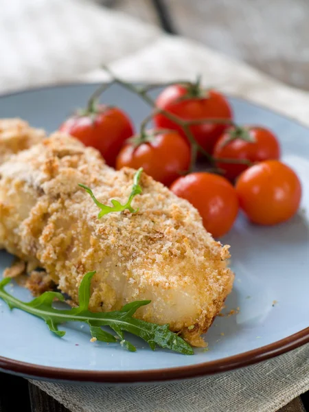 Fish fillet with tomatoes — Stock Photo, Image
