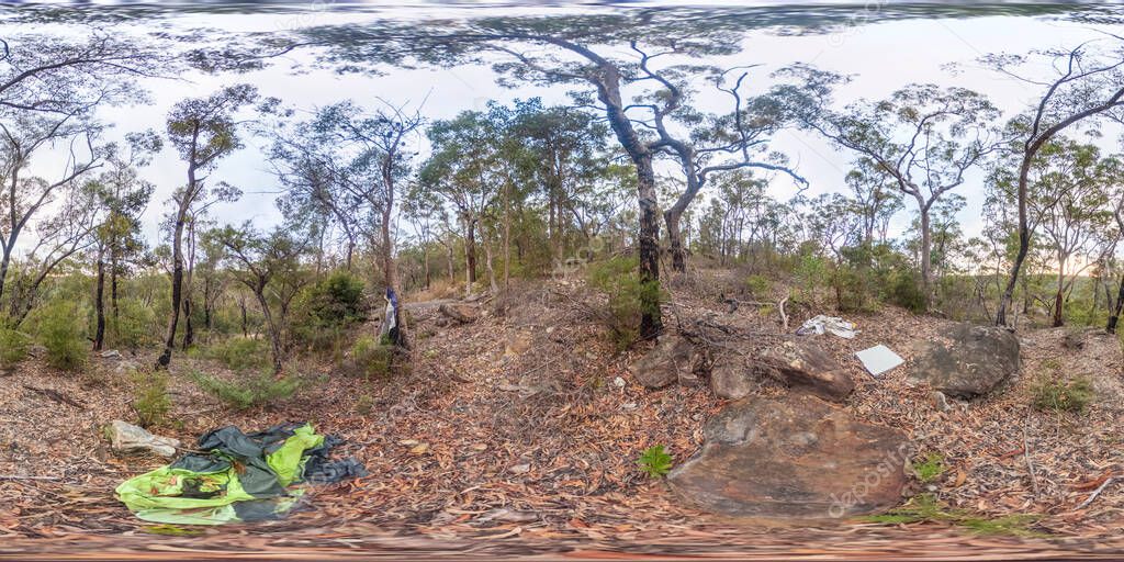 Spherical panoramic photograph of garbage left in a forest in The Blue Mountains in regional New South Wales in Australia