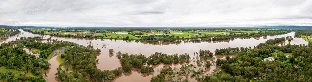 Drone aerial panoramic photograph of severe flooding in the Hawkesbury Nepean River in the Yarramundi region of the Hawkesbury in New South Wales in Australia.