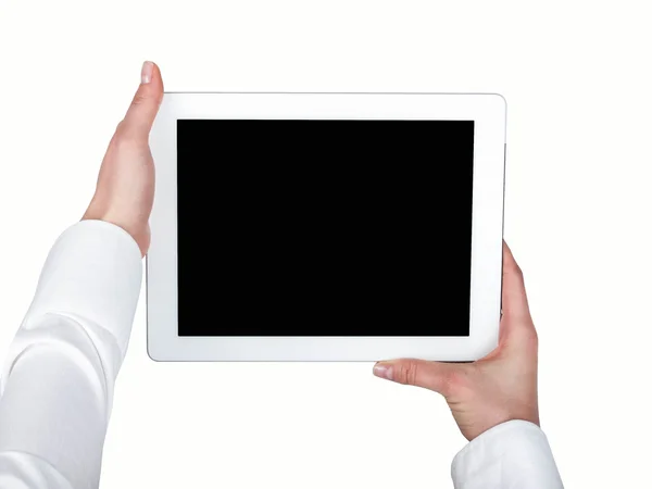 Tablet PC gehouden in de handen van de vrouwen op een witte achtergrond — Stockfoto