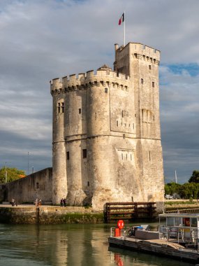 La rochelle, France, July 2022. St. Nicolas Tower one of the two towers in the port of La Rochelle view of the walls at sunset