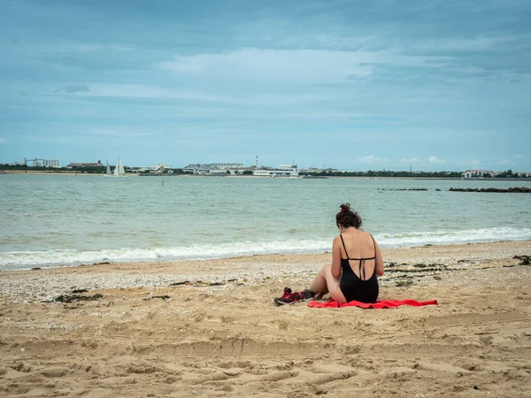 Rochelle France July 2022 Woman Sitting Alone Her Back Lens — Stock Photo, Image