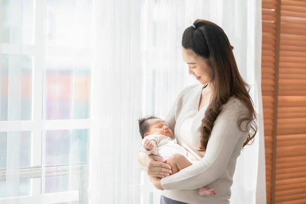 Beautiful Asian Woman Holding Newborn Baby Her Arms Standing Front Stock Image