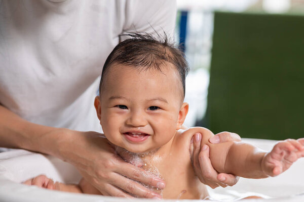 Cheerful Asian Newborn Baby Enjoying Bathing Bathtub Mother Bathing Her Stock Photo