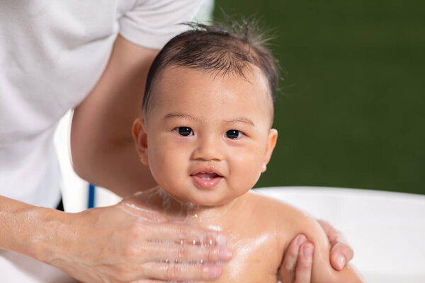 Cheerful Asian Newborn Baby Enjoying Bathing Bathtub Mother Bathing Her Stock Photo