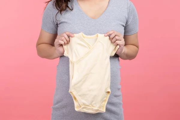 Asian Pregnant Woman Holding Baby Cloth Baby Newborn Isolated Pink — Stockfoto