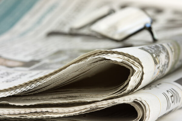 Газета со спецификациями
