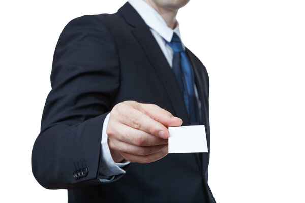 Young business man offering a business card