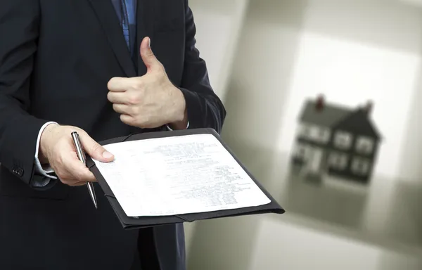 Businessman gives the signature on the contract — Stock Photo, Image