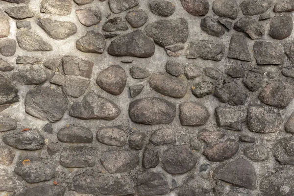 Ender bulunan büyük taşlı taş duvar. Bir Arkaplan Olarak Dokular