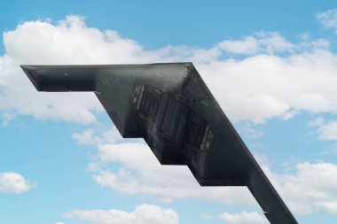 Pasadena, California, USA - January 1, 2018: image of Northrop Grumman B-2 Spirit of New York shown flying over Pasadena during the Tournament of Roses.