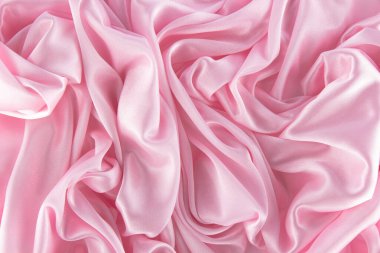 Pembe ipek ya da saten dokular düğün arkaplanı olarak kullanılabilir. lüks arka plan tasarımı