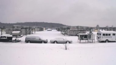 Cars parked by BOMARC nuclear missile site in winter, North Bay, Ontario, Canada
