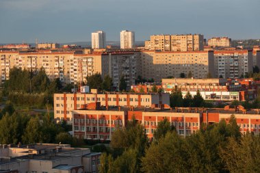 provincial city of Russia with high-rise buildings in the evening
