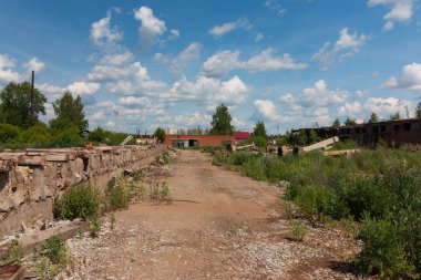 dismantled concrete paths to an abandoned area