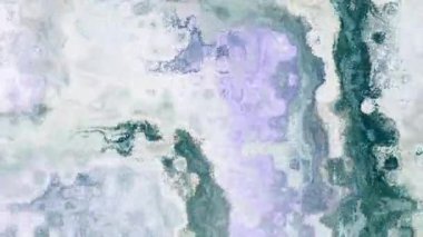 Ayrıntılı parçacık dokusunu canlı renklerle değiştiren 4k arkaplan videosu