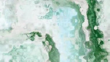 Ayrıntılı parçacık dokusunu canlı renklerle değiştiren 4k arkaplan videosu