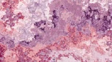 Ayrıntılı parçacık dokusunu canlı renklerle değiştiren 4k arkaplan videosu