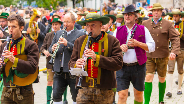Opening ceremony and parade of the Oktoberfest after two years of Covid-19 pause on the 17 september 2022 in Munich, Germany. Horse carriages and bands takes part in the Oktoberfest procession.