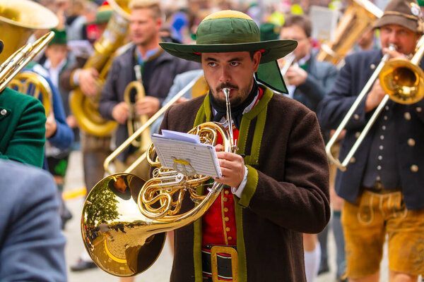 Opening ceremony and parade of the Oktoberfest after two years of Covid-19 pause on the 17 september 2022 in Munich, Germany. Horse carriages and bands takes part in the Oktoberfest procession.