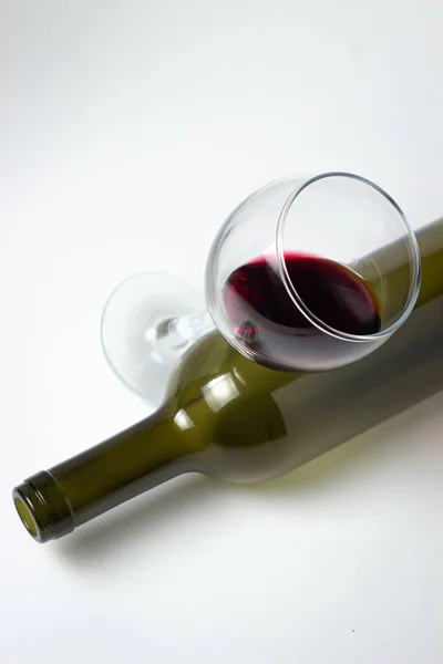 Glass Red Wine Empty Bottle White Background Excessive Alcohol Consumption — Fotografia de Stock