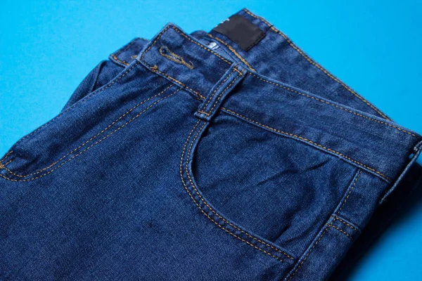 Jeans close-up. Modern comfortable clothes. Denim blue jeans texture