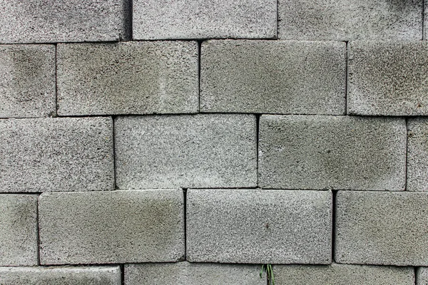 Texture of cinder blocks. Stacked cinder blocks as a background for your image. Construction material.