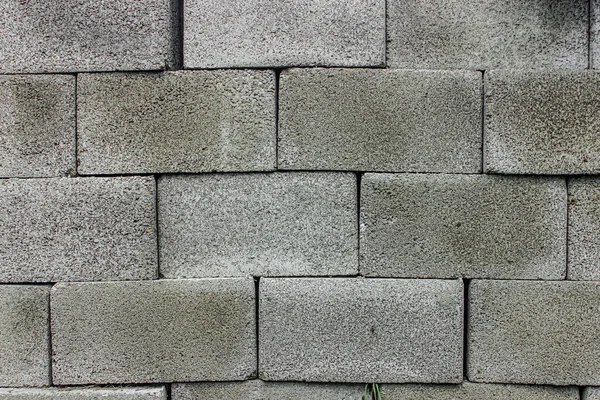 Texture of cinder blocks. Stacked cinder blocks as a background for your image. Construction material.