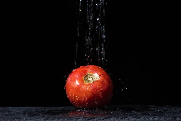 Water Pours Tomato Black Background Fresh Healthy Vegetable Healthy Diet — Stock Photo, Image